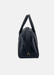 Bauletto in pelle con dettagli oro
