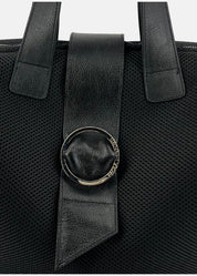 Bauletto con patta in tessuto tecnico traforato e pelle