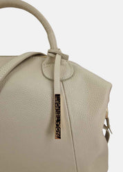 Bauletto in pelle morbida con dettagli oro
