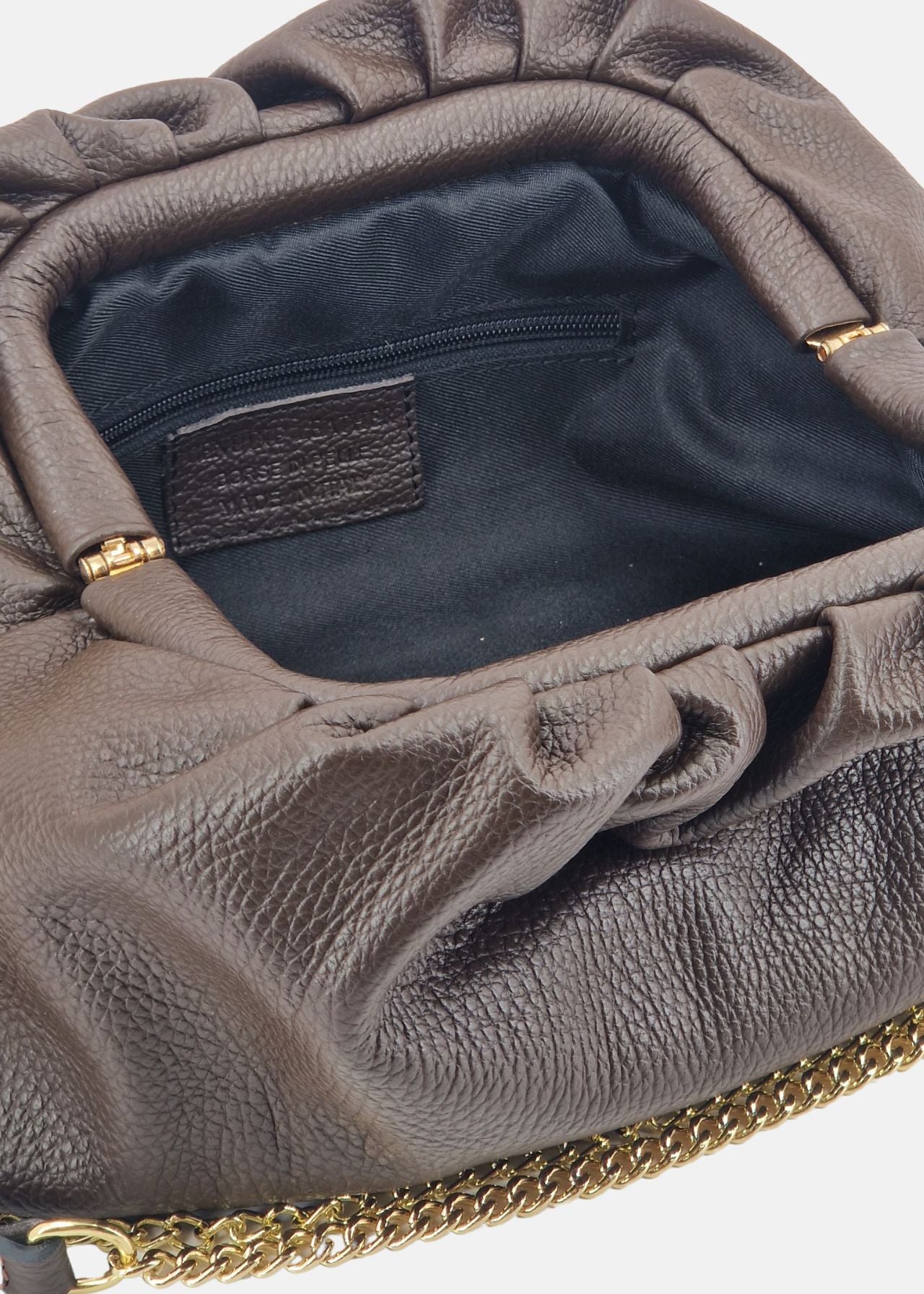 Clutch in vera pelle