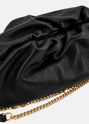 Clutch in vera pelle