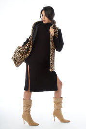 Gilet con cappuccio in eco pelliccia