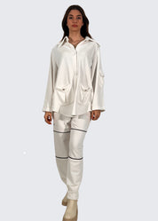Pantalone con piping a contrasto